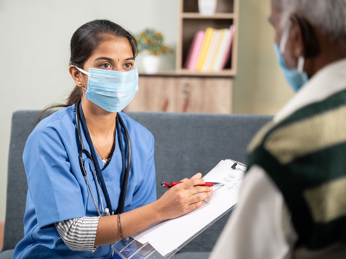 nurse talks to patient